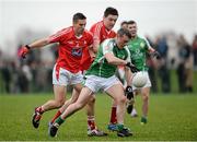 31 January 2016; Adrian Hanlon, London, in action against Padraig Rath, left, and Tommy Durnin, Louth. Allianz Football League, Division 4, Round 1, Louth v London. Louth Centre of Excellence, Darver, Co. Louth. Photo by Sportsfile