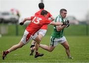 31 January 2016; Adrian Hanlon, London, in action against Conal McKeever, Louth. Allianz Football League, Division 4, Round 1, Louth v London. Louth Centre of Excellence, Darver, Co. Louth. Photo by Sportsfile