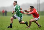 31 January 2016; Scott Conroy, London, in action against Padraig Rath, Louth. Allianz Football League, Division 4, Round 1, Louth v London. Louth Centre of Excellence, Darver, Co. Louth. Photo by Sportsfile