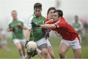 31 January 2016; Sean Hickey, London, in action against Kevin Toner, Louth. Allianz Football League, Division 4, Round 1, Louth v London. Louth Centre of Excellence, Darver, Co. Louth. Photo by Sportsfile