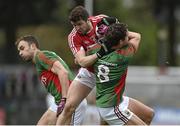31 January 2016; Tomas Clancy, Cork, in action against Jason Gibbons, left, and Tom Parsons, Mayo. Allianz Football League, Division 1, Round 1, Cork v Mayo. Páirc Ui Rinn, Cork. Picture credit: Diarmuid Greene / SPORTSFILE