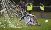 31 January 2016; Darren Hughes, Monaghan, gets stuck in the net after a goal scoring chance. Allianz Football League, Division 1, Round 1, Roscommon v Monaghan, Kiltoom, Roscommon. Picture credit: Stephen McCarthy / SPORTSFILE