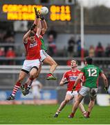 31 January 2016; Tom Parsons, Mayo, in action against Ian McGuire, Cork. Allianz Football League, Division 1, Round 1, Cork v Mayo, Páirc Ui Rinn, Cork. Picture credit: Eoin Noonan / SPORTSFILE