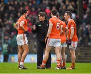 31 January 2016; Armagh manager Kieran McGeeney speaking to his players including Stefan Campbell, 10, Miceal McKenna, 11, and Mark Shields as they await the arrival of the Meath players after the half time break. Allianz League, Division 2, Round 1, Meath v Armagh, Páirc Tailteann, Navan, Co. Meath. Picture credit: Ray McManus / SPORTSFILE