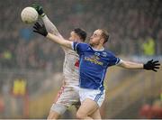 31 January 2016; Paul O'Connor, Cavan, in action against Cathal McCarron, Tyrone. Allianz Football League, Division 2, Round 1, Tyrone v Cavan, Healy Park, Omagh, Co. Tyrone. Picture credit: Oliver McVeigh / SPORTSFILE