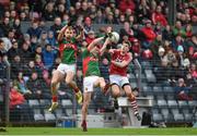 31 January 2016; Diarmuid O'Connor and Jason Gibbons, left, Mayo, in action against Ian Maguire, Cork. Allianz Football League, Division 1, Round 1, Cork v Mayo. Páirc Ui Rinn, Cork. Picture credit: Diarmuid Greene / SPORTSFILE