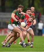 31 January 2016; Andrew O'SullEvan, Cork, in action against Aidan O'Shea, left, and Jason Doherty, Mayo. Allianz Football League, Division 1, Round 1, Cork v Mayo. Páirc Ui Rinn, Cork. Picture credit: Diarmuid Greene / SPORTSFILE