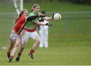 31 January 2016; Cora Staunton, Mayo, in action against Róisín Phelan, Cork. Lidl Ladies Football National League, Division 1, Cork v Mayo, Mallow, Co. Cork. Picture credit: Piaras Ó Mídheach / SPORTSFILE