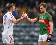 31 January 2016; Cork goalkeeper Ken O'Halloran and Mayo's Jason Gibbons exchange a handshake after the game. Allianz Football League, Division 1, Round 1, Cork v Mayo. Páirc Ui Rinn, Cork. Picture credit: Diarmuid Greene / SPORTSFILE