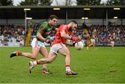 31 January 2016; Colm O'Driscoll, Cork, in action against Tom Parsons, Mayo. Allianz Football League, Division 1, Round 1, Cork v Mayo. Páirc Ui Rinn, Cork. Picture credit: Diarmuid Greene / SPORTSFILE