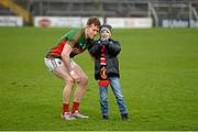 31 January 2016; Mayo supporter Aodh O Croinín, aged 10, from Claremorris, Co. Mayo, takes a selfie after the game with Mayo's Donal Vaughan. Allianz Football League, Division 1, Round 1, Cork v Mayo. Páirc Ui Rinn, Cork. Picture credit: Diarmuid Greene / SPORTSFILE