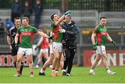 31 January 2016; Lee Keegan, Mayo, is assisted off the pitch by Dr Sean Moffatt after picking up an injury. Allianz Football League, Division 1, Round 1, Cork v Mayo. Páirc Ui Rinn, Cork. Picture credit: Diarmuid Greene / SPORTSFILE
