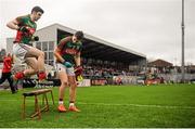 31 January 2016; Brendan Harrison, left and Lee Keegan, right, Mayo, take their seats for the team photo before the game. Allianz Football League, Division 1, Round 1, Cork v Mayo, Páirc Ui Rinn, Cork. Picture credit: Eoin Noonan/SPORTSFILE