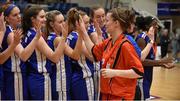 31 January 2016; Team Montenotte Hotel players give a high five to defeated Pyrobel Killester's Aisling McCann after the game. Basketball Ireland Women's National Cup Final, Team Montenotte Hotel, Cork v Pyrobel Killester, National Basketball Arena, Tallaght, Co. Dublin. Picture credit: Brendan Moran / SPORTSFILE