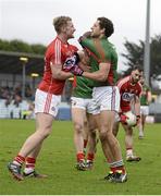 31 January 2016; Ruairi Deane, Cork, and Tom Parsons, Mayo, tussle off the ball. Allianz Football League, Division 1, Round 1, Cork v Mayo. Páirc Ui Rinn, Cork. Picture credit: Diarmuid Greene / SPORTSFILE