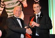 15 November 2009; Jerry Harris, left, Cork City FC, is presented with the Special Merit Award by Ollie Cahill, Professional Footballers Association of Ireland. PFAI Ford Awards 2009, The Burlington Hotel, Dublin. Picture credit: Brendan Moran / SPORTSFILE