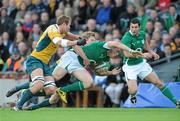 15 November 2009; Jamie Heaslip, Ireland, supported by Rob Kearney, in action against Rocky Elsom, left, and Peter Hynes, Australia. Autumn International Guinness Series 2009, Ireland v Australia, Croke Park, Dublin. Picture credit: Brian Lawless / SPORTSFILE