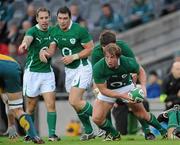 15 November 2009; Jerry Flannery, Ireland, supported by team-mates Tomas O'Leary, left, and David Wallace. Autumn International Guinness Series 2009, Ireland v Australia, Croke Park, Dublin. Picture credit: Brian Lawless / SPORTSFILE