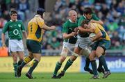 15 November 2009; Ben Alexander, Australia, is tackled by Donncha O'Callaghan and Paul O'Connell, Ireland. Autumn International Guinness Series 2009, Ireland v Australia, Croke Park, Dublin. Picture credit: Brian Lawless / SPORTSFILE
