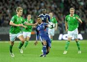 14 November 2009; Patrice Evra, France, in action against Kevin Doyle, Republic of Ireland. FIFA 2010 World Cup Qualifying Play-off 1st Leg, Republic of Ireland v France, Croke Park, Dublin. Photo by Sportsfile