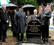 18 November 2009; Chief Superintendent of the PSNI Gerry O'Callaghan speaking at the Unveiling of the Headstone to Thomas St. George McCarthy while Uachtarán CLG Gael Criostóir Ó Cuana and Garda Commissioner Fachtna Murphy look on. Deansgrange Cemetery, Dublin. Picture credit: Pat Murphy / SPORTSFILE