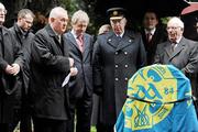 18 November 2009; Uachtarán CLG Gael Criostóir Ó Cuana speaking at the unveiling of the Headstone to Thomas St. George McCarthy while Paraic Duffy, Ard Stiurthoir of the GAA, and Garda Commissioner Facthna Murphy look on. Deansgrange Cemetery, Dublin. Picture credit: Pat Murphy / SPORTSFILE