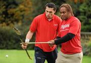 18 November 2009; Fijian-born Cork hurling star, Seán Óg Ó hAilpín, shows a few skills to Fiji centre Gabby Lovobalavu on a visit to the Fijian Rugby team at its camp in Dublin. The rugby players were treated to a hurling skills session with one of the biggest names in Gaelic games, courtesy of Digicel who are sponsoring the Fijians’ trip to Ireland. Speaking after today’s coaching session, Ó hAilpín said: “Today was a great opportunity for me to show visitors to Ireland what Gaelic games are all about. I was born in Fiji and lived there until I was three, so I’m delighted that Digicel was able to organize this coaching session.” The Fijians play Ireland in the RDS on Saturday, November 21st, in the RDS. Kick off is at 17.15. A limited number of tickets are still available from the Spar shop in Donnybrook. Radisson Blu St Helens Hotel, Stillorgan Road, Dublin. Picture credit: Brendan Moran / SPORTSFILE
