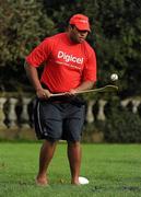 18 November 2009; Fijian prop Aisake Tarogi tries his hand at hurling during a visit to the team camp in Dublin by Fijian-born Cork hurling star, Seán Óg Ó hAilpín. The rugby players were treated to a hurling skills session with one of the biggest names in Gaelic games, courtesy of Digicel who are sponsoring the Fijians’ trip to Ireland. Speaking after today’s coaching session, Ó hAilpín said: “Today was a great opportunity for me to show visitors to Ireland what Gaelic games are all about. I was born in Fiji and lived there until I was three, so I’m delighted that Digicel was able to organize this coaching session.” The Fijians play Ireland in the RDS on Saturday, November 21st, in the RDS. Kick off is at 17.15. A limited number of tickets are still available from the Spar shop in Donnybrook. Radisson Blu St Helens Hotel, Stillorgan Road, Dublin. Picture credit: Brendan Moran / SPORTSFILE