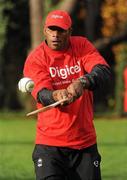 18 November 2009; Fijian rubgy player, Asaeli Boko tries his hand at hurling during a visit to the team camp in Dublin by Fijian-born Cork hurling star, Seán Óg Ó hAilpín. The rugby players were treated to a hurling skills session with one of the biggest names in Gaelic games, courtesy of Digicel who are sponsoring the Fijians’ trip to Ireland. Speaking after today’s coaching session, Ó hAilpín said: “Today was a great opportunity for me to show visitors to Ireland what Gaelic games are all about. I was born in Fiji and lived there until I was three, so I’m delighted that Digicel was able to organize this coaching session.” The Fijians play Ireland in the RDS on Saturday, November 21st, in the RDS. Kick off is at 17.15. A limited number of tickets are still available from the Spar shop in Donnybrook. Radisson Blu St Helens Hotel, Stillorgan Road, Dublin. Picture credit: Brendan Moran / SPORTSFILE