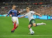 18 November 2009; Kevin Doyle, Republic of Ireland, in action against Sebastien Squillaci, France. FIFA 2010 World Cup Qualifying Play-off 2nd Leg, Republic of Ireland v France, Stade de France, Saint Denis, Paris. Picture credit: David Maher / SPORTSFILE