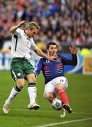 18 November 2009; Andre Pierre Gignac, France, in action against Liam Lawrence, Republic of Ireland. FIFA 2010 World Cup Qualifying Play-off 2nd Leg, Republic of Ireland v France, Stade de France, Saint Denis, Paris. Picture credit: David Winter / SPORTSFILE