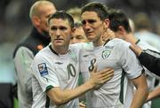 18 November 2009; Republic of Ireland players Robbie Keane and Keith Andrews comfort each other after the final whistle FIFA 2010 World Cup Qualifying Play-off 2nd Leg, Republic of Ireland v France, Stade de France, Saint Denis, Paris. Picture credit: David Maher / SPORTSFILE