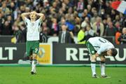 18 November 2009; Dejected Republic of Ireland players Kevin Doyle and Robbie Keane at the final whistle. FIFA 2010 World Cup Qualifying Play-off 2nd Leg, Republic of Ireland v France, Stade de France, Saint-Denis, Paris. Picture credit: David Maher / SPORTSFILE