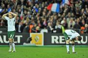 18 November 2009; Dejected Republic of Ireland players Kevin Doyle, left, and Robbie Keane after the match. FIFA 2010 World Cup Qualifying Play-off 2nd Leg, Republic of Ireland v France, Stade de France, Saint-Denis, Paris. Picture credit: David Maher / SPORTSFILE