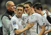 18 November 2009; Republic of Ireland players Robbie Keane and Keith Andrews comfort each other after the final whistle FIFA 2010 World Cup Qualifying Play-off 2nd Leg, Republic of Ireland v France, Stade de France, Saint Denis, Paris. Picture credit: David Maher / SPORTSFILE