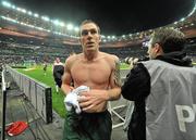 18 November 2009; Republic of Ireland player Richard Dunne, prepares to throw his jersey to supporters, at the end of the game. FIFA 2010 World Cup Qualifying Play-off 2nd Leg, Republic of Ireland v France, Stade de France, Saint-Denis, Paris, France. Picture credit: David Maher / SPORTSFILE