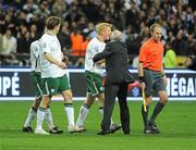 18 November 2009; Paul McShane, Republic of Ireland, is restrained by assistant manager Liam Brady. FIFA 2010 World Cup Qualifying Play-off 2nd Leg, Republic of Ireland v France, Stade de France, Saint-Denis, Paris, France. Picture credit: Stephen McCarthy / SPORTSFILE