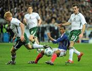 18 November 2009; Patrice Evra, France, in action against Paul McShane, left, and Darron Gibson, Republic of Ireland. FIFA 2010 World Cup Qualifying Play-off 2nd Leg, Republic of Ireland v France, Stade de France, Saint-Denis, Paris, France. Picture credit: Stephen McCarthy / SPORTSFILE