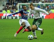 18 November 2009; Aiden McGeady, Republic of Ireland, in action against Sidney Govou, France. FIFA 2010 World Cup Qualifying Play-off 2nd Leg, Republic of Ireland v France, Stade de France, Saint-Denis, Paris, France. Picture credit: Stephen McCarthy / SPORTSFILE