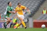 27 September 2009; Claire Timoney, Antrim, scores her side's first goal despite the attentions of Maggie O'Brien, Limerick. TG4 All-Ireland Ladies Football Junior Championship Final, Antrim v Limerick, Croke Park, Dublin. Picture credit: Ray McManus / SPORTSFILE