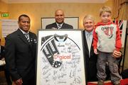 20 November 2009; The Fijian rugby team welcomed Mr Denis O’Brien, Founder of Digicel, the Fijian rugby team sponsor, to the official team blessing. The Fijian ritual, which took place at the Radisson Hotel, Stillorgan, involves the blessing of the team jerseys before each game. The team then presented Mr O’Brien with a signed jersey ahead of their clash with Ireland. Pictured are, Mr Denis O’Brien, Founder of Digicel, his son Patrick, age 5, being presented with a signed jersey by Fiji captain Seremaia Bai, left, and Head Coach Sam Domoni. Radisson Blu St Helens Hotel, Stillorgan Road, Dublin. Picture credit: Brian Lawless / SPORTSFILE