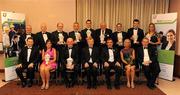 20 November 2009; Ulster GAA Writers Award winners. Back row from left, Bernie Mullan, Jerry Qunn, writers chairman, Damien Harvey, representing Kevin Hughes, Pat McEnaney, Neil McManus, Feargal McCormick, Paul Brady, Michael Murphy, Grainne McGoldrick. Front row from left, John Maguire, MD Belleek Pottery, Colette Little, Liam Bradley, Ard Stiúrthóir Páraic Duffy, Tom Daly, President Ulster GAA, Fiona Shannon, and Sean Quinn, Quinn Insurance, at the Ulster GAA Writers Annual Awards Banquet 2009. The 22nd Ulster GAA Writers Association Awards Banquet, sponsored by Quinn Insurance, Slieve Russell Hotel, Ballyconnell, Co. Cavan. Picture credit: Oliver McVeigh / SPORTSFILE