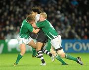 21 November 2009; Nicky Little, Fiji, is tackled by Jerry Flannery, left, and Leo Cullen, right, Ireland. Autumn International Guinness Series 2009, Ireland v Fiji, Royal Dublin Society, Ballsbridge, Dublin. Picture credit: Stephen McCarthy / SPORTSFILE