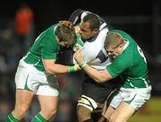 21 November 2009; Leone Nakarawa, Fiji, is tackled by Sean O’Brien, left, and Jamie Heaslip, Ireland. Autumn International Guinness Series 2009, Ireland v Fiji, Royal Dublin Society, Ballsbridge, Dublin. Picture credit: Stephen McCarthy / SPORTSFILE