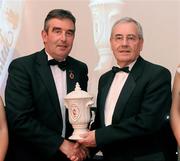 20 November 2009 : Bernie Mullan, from Derry, who won the Services to GAA Award, right, receives his award from Tom Daly, Ulster GAA President, at the Ulster GAA writers Annual Awards Banquet 2009. The 22nd Ulster GAA Writers Association  Award Banquet, sponsored by Quinn Insurance, Slieve Russell Hotel, Ballyconnell, Co. Cavan. Picture credit: Oliver McVeigh / SPORTSFILE