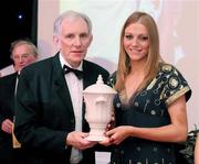 20 November 2009 : Grainne McGoldrick , from Derry, who won the Camogie Award, right, receives her award from John Campbell, at the Ulster GAA writers Annual Awards Banquet 2009. The 22nd Ulster GAA Writers Association  Award Banquet, sponsored by Quinn Insurance, Slieve Russell Hotel, Ballyconnell, Co. Cavan. Picture credit: Oliver McVeigh / SPORTSFILE