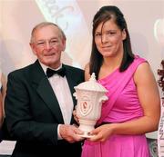 20 November 2009 : Colette Little , from Fermanagh, who won the Ladies Footballer of the year Award, right, receives his award from Matt Fitzpatrick, at the Ulster GAA writers Annual Awards Banquet 2009. The 22nd Ulster GAA Writers Association  Award Banquet, sponsored by Quinn Insurance, Slieve Russell Hotel, Ballyconnell, Co. Cavan. Picture credit: Oliver McVeigh / SPORTSFILE