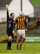 17 January 2016; Kilkenny's Lester Ryan is shown the yellow card by referee Alfie Devine. Bord na Mona Walsh Cup Group 1, Offaly v Kilkenny. St Brendan's Park, Birr, Co. Offaly. Picture credit: Piaras Ó Mídheach / SPORTSFILE