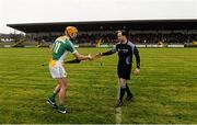 17 January 2016; Offaly captain Colin Egan shakes hands with referee Alfie Devine before the game. Bord na Mona Walsh Cup Group 1, Offaly v Kilkenny. St Brendan's Park, Birr, Co. Offaly. Picture credit: Piaras Ó Mídheach / SPORTSFILE