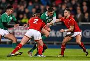 5 February 2016; Johnny McPhillips, Ireland, is tackled by Dafydd Hughes, left, and Declan Smith, Wales. Electric Ireland U20 Six Nations Rugby Championship, Ireland v Wales, Donnybrook Stadium, Donnybrook, Dublin. Picture credit: Ramsey Cardy / SPORTSFILE